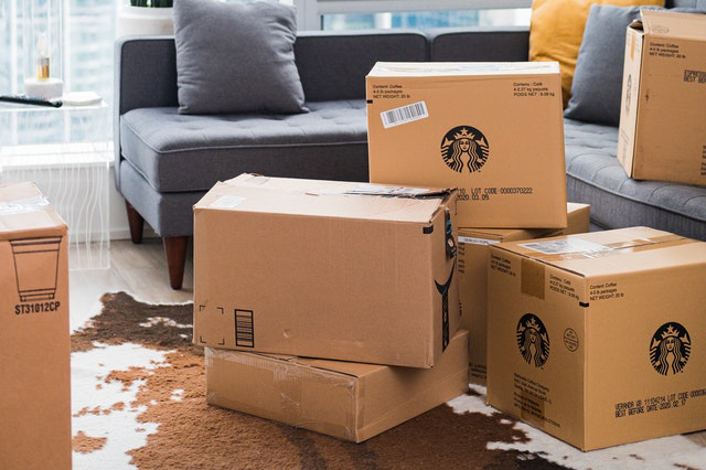 Cardboard boxes in a living room